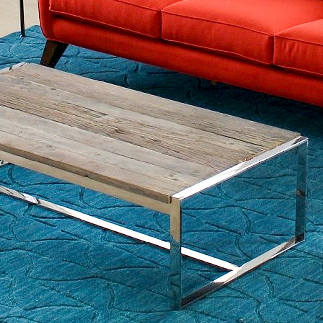 60f299d7808200885cd4b0a2_Stainless-Steel-and-timber-table